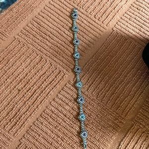 Sterling Silver .825 bracelet with lab created heart shaped stones